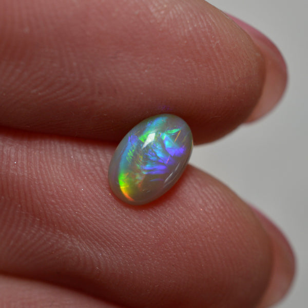 0.89ct Dark Rainbow rolling Flash (Lightning Ridge)