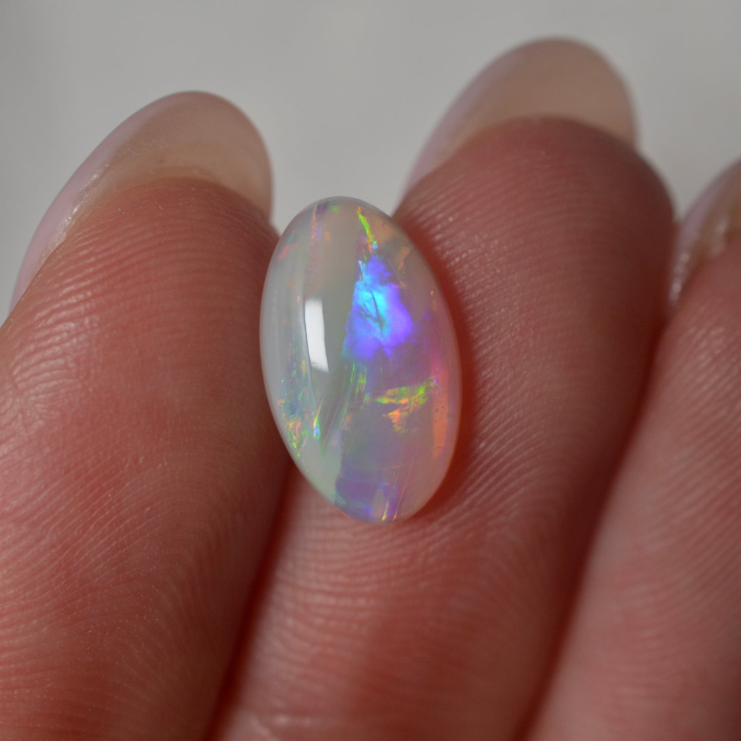 2.16ct Unique Purple & Gold Oval