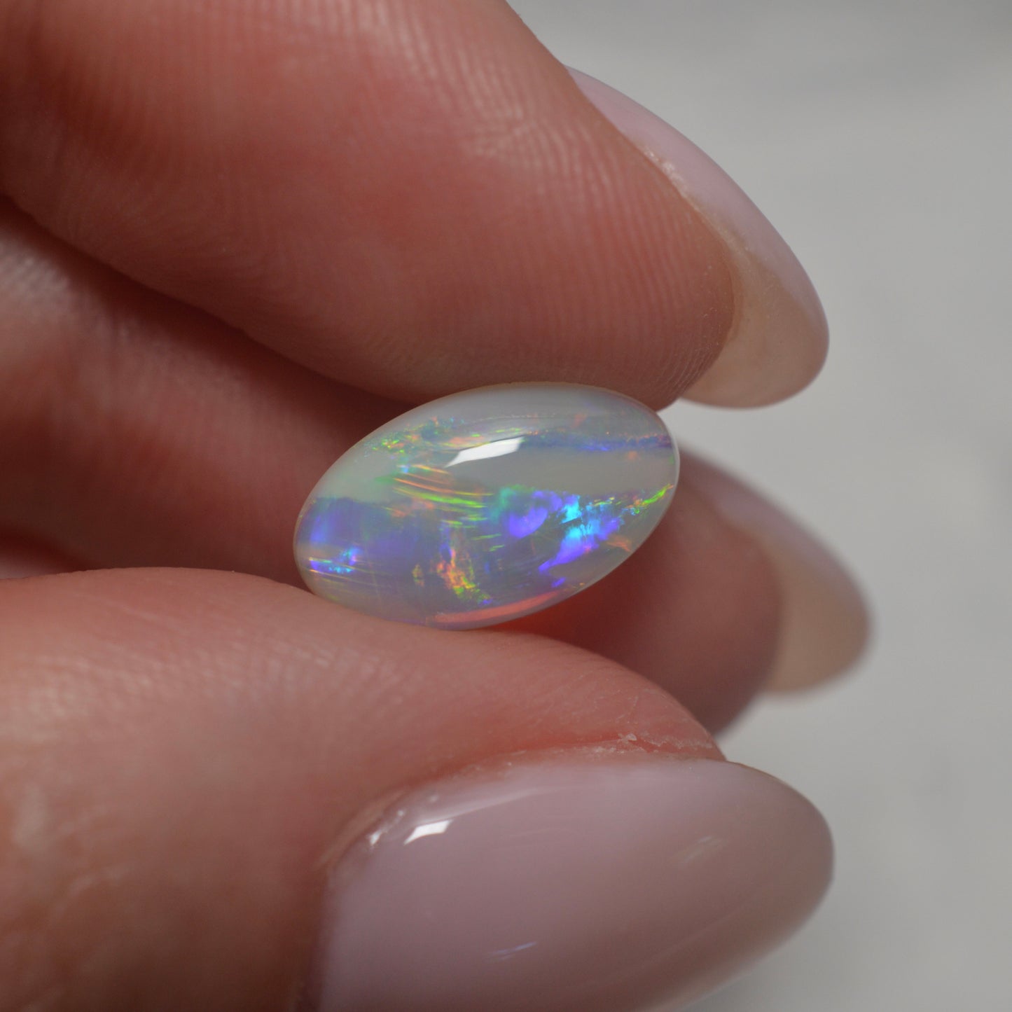 2.16ct Unique Purple & Gold Oval