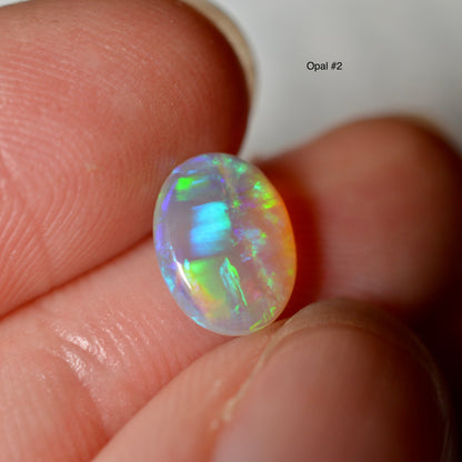 2.41ct Vivid (High Grade) Oval Pair